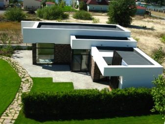 Проекты современных домов с плоской крышей: особенности выбора и обустройства кровли